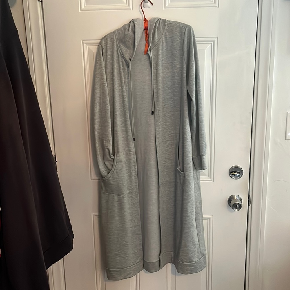 Long gray sweatshirt jacket. Size large. 2 front pockets. Super comfy!
